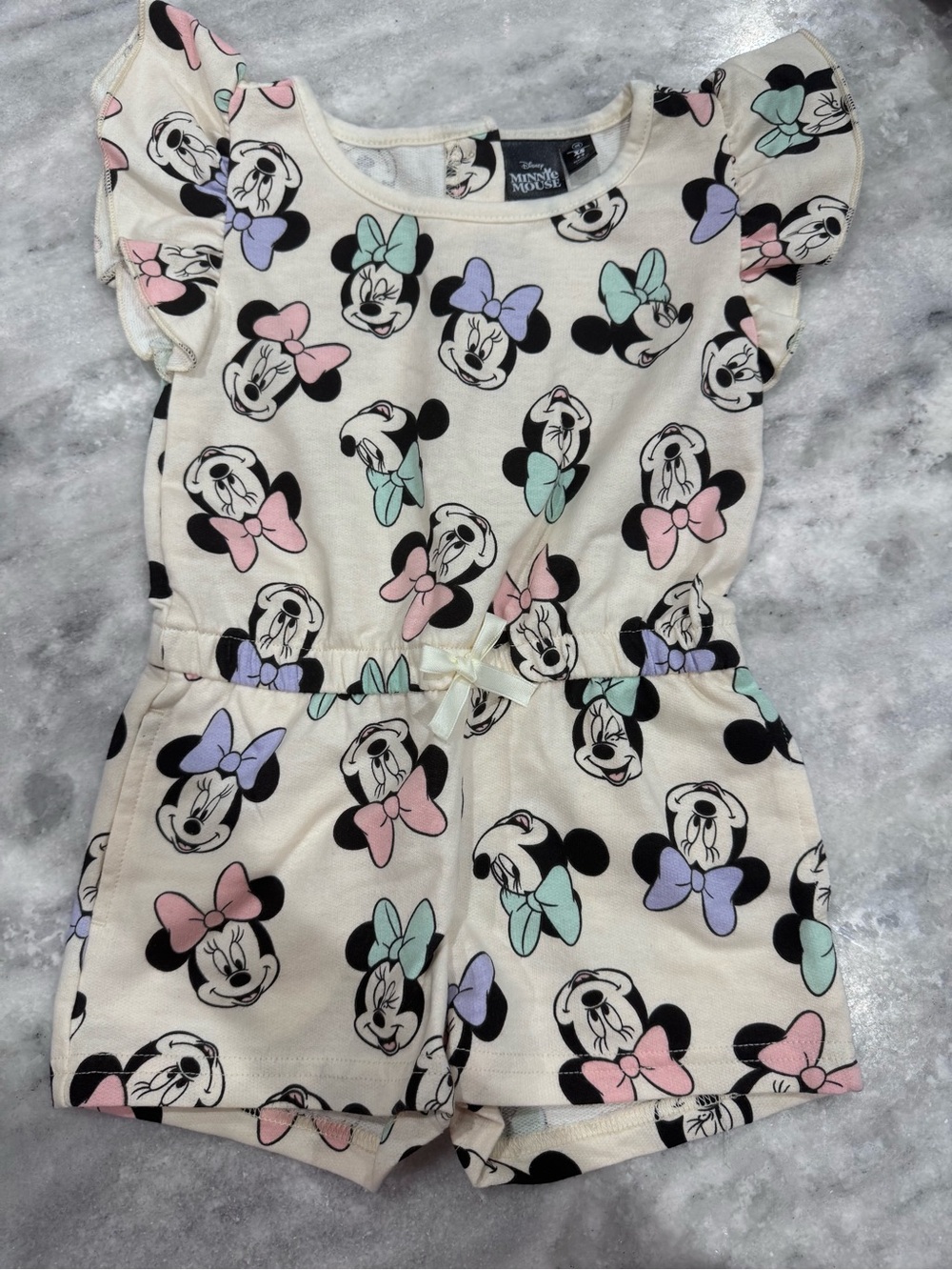 Disney Cream Minnie Mouse Bow Print Romper with Pastel Accents